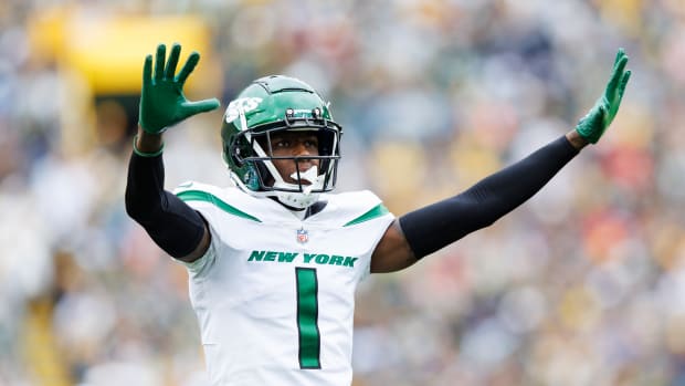 Oct 16, 2022; Green Bay, Wisconsin, USA; New York Jets cornerback Sauce Gardner (1) celebrates following a play during the second quarter against the Green Bay Packers at Lambeau Field. Mandatory Credit: Jeff Hanisch-USA TODAY Sports